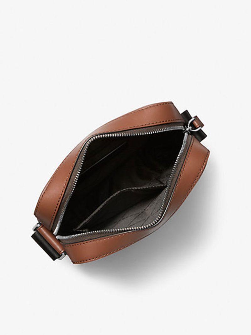 MICHAEL Michael Kors Cooper Logo Embossed Pebbled Leather Flight Bag - Image 2