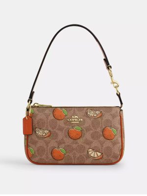 COACH Nolita 19 In Signature Canvas With Orange Print