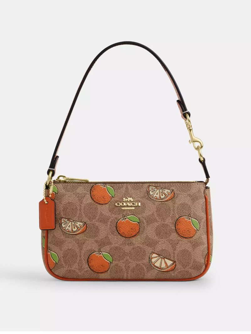 COACH Nolita 19 In Signature Canvas With Orange Print