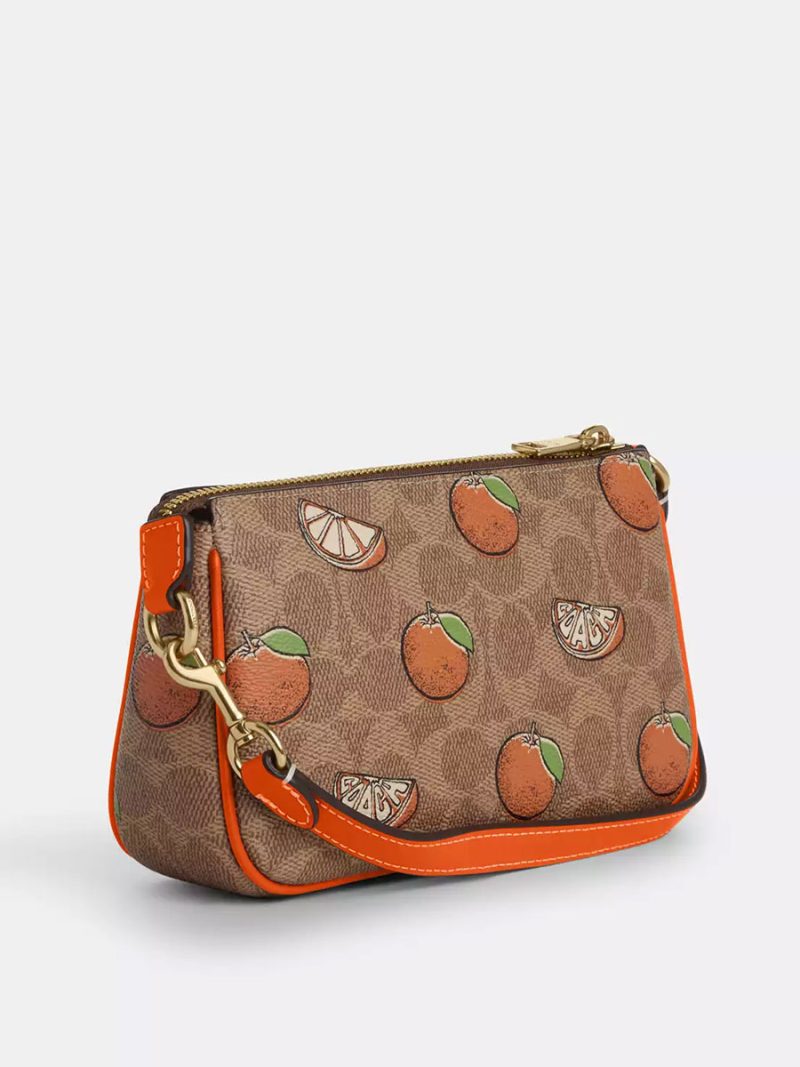 COACH Nolita 19 In Signature Canvas With Orange Print - Image 4