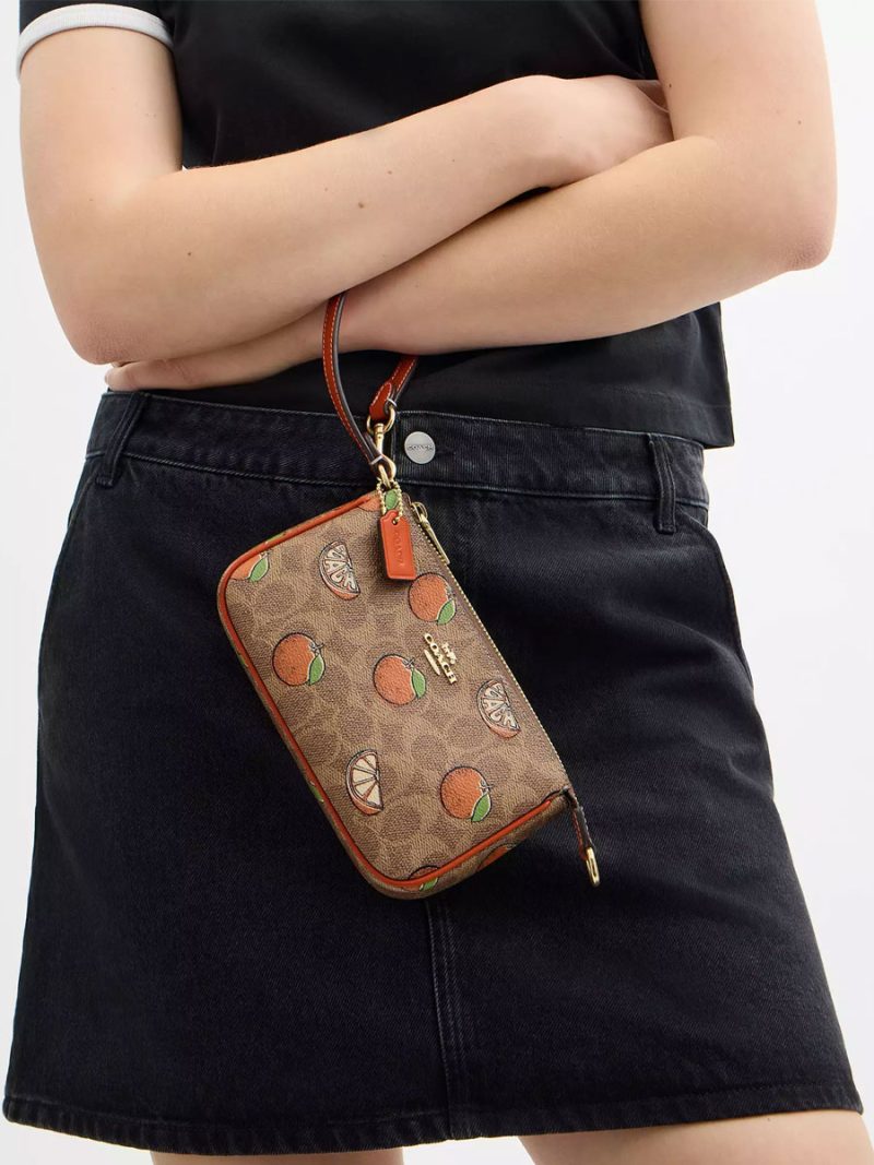 COACH Nolita 19 In Signature Canvas With Orange Print - Image 5