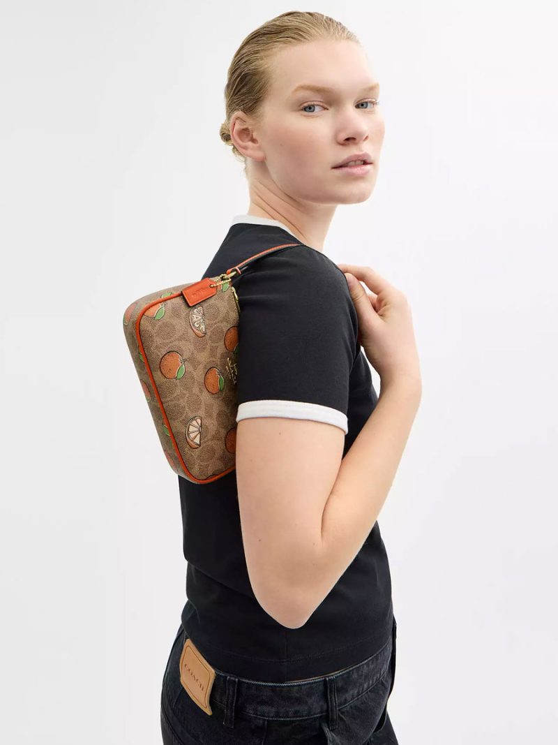 COACH Nolita 19 In Signature Canvas With Orange Print - Image 6