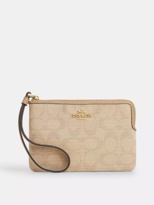 COACH Corner Zip Wristlet With Signature Canvas