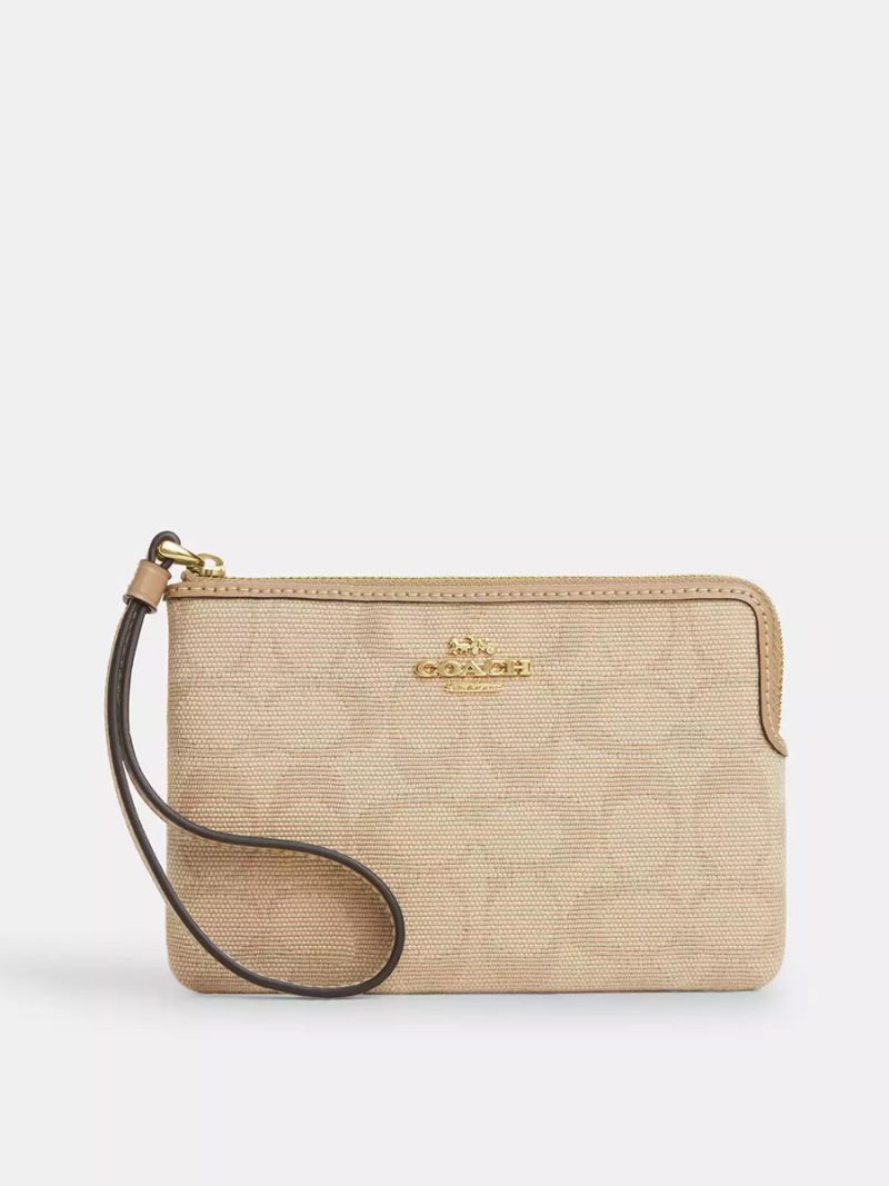 COACH Corner Zip Wristlet With Signature Canvas