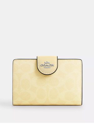 COACH Medium Corner Zip Wallet In Signature Canvas