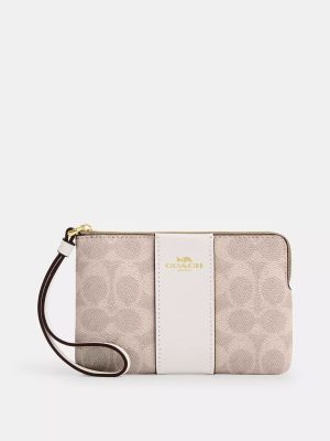 COACH Corner Zip Wristlet In Signature Canvas With Stripe